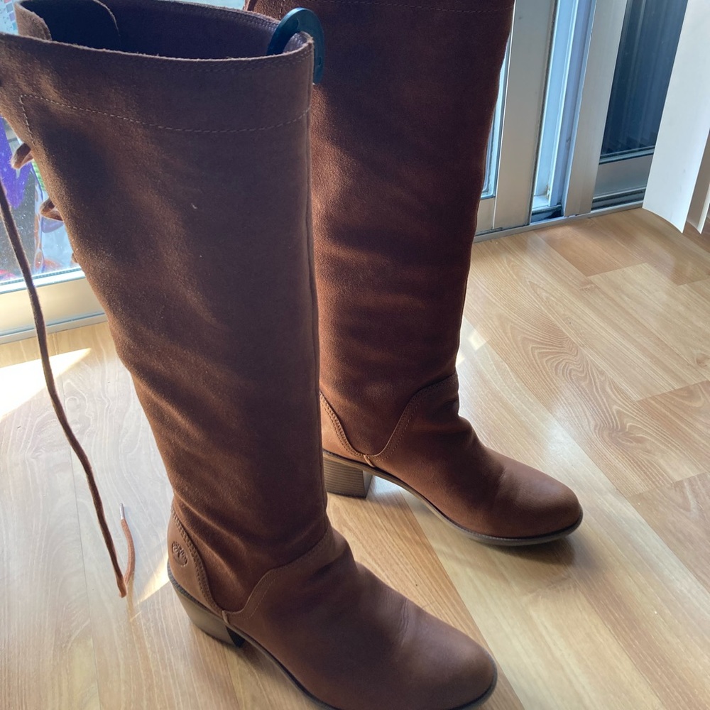 A pair of leather Timberland boots.